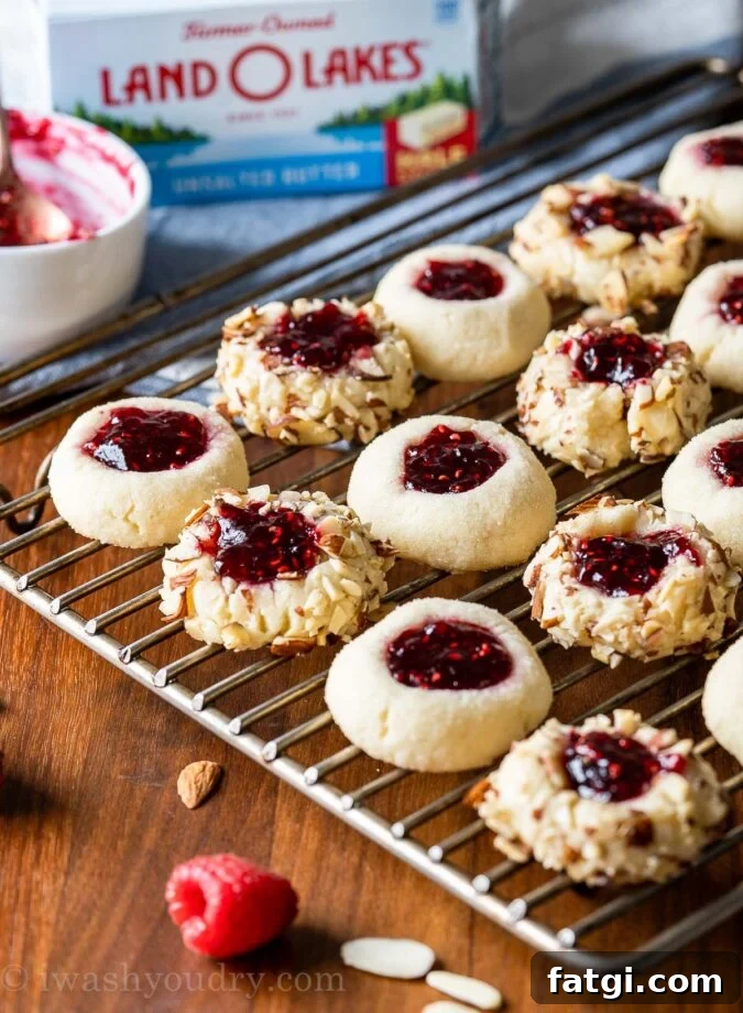 cookies on cooling rack with almonds