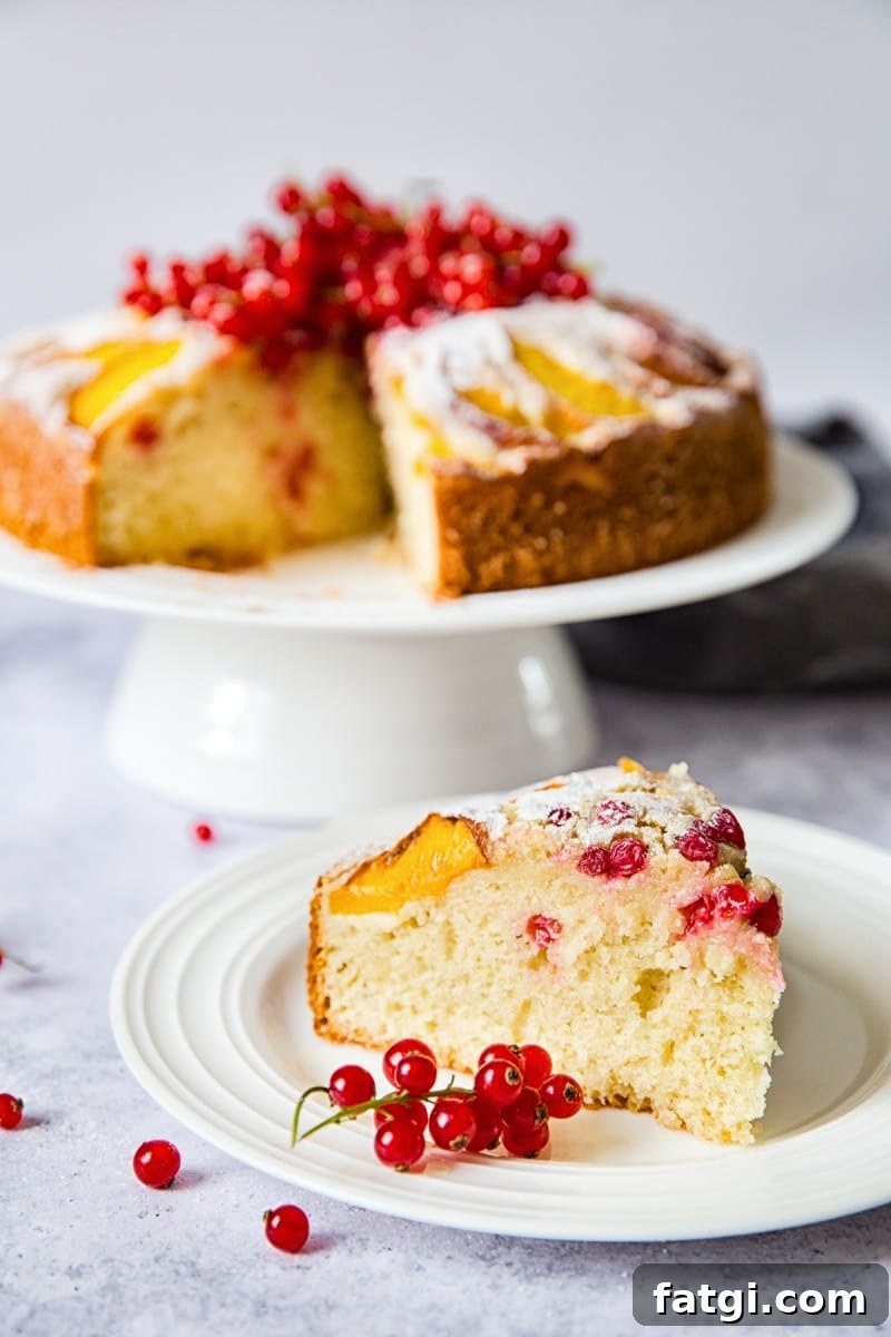 slice of cake in foreground with cake behind