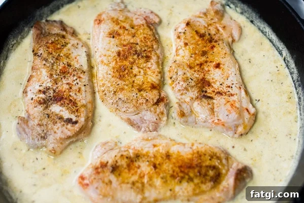 Juicy Milk Braised Pork Chops with Mustard Sauce 7 Pork chops added back into skillet with the sauce