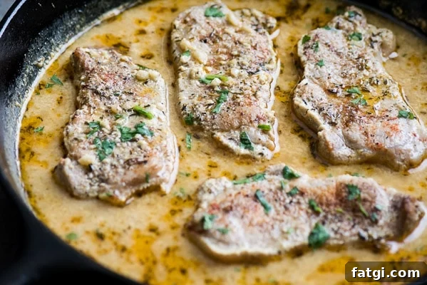 Juicy Milk Braised Pork Chops with Mustard Sauce 8 Baked pork chops and sauce in skillet