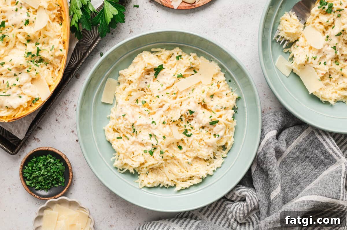 Spaghetti Squash Alfredo with Creamy Garlic Parmesan Sauce 3 spaghetti squash alfredo on plate with shaved parmesan