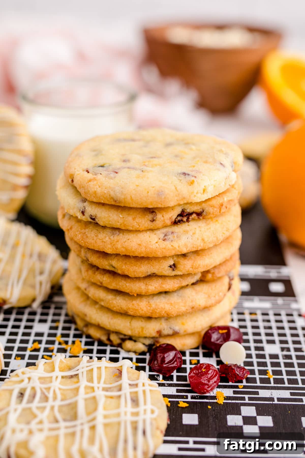 cranberry orange shortbread cookie closeup of them stacked up