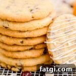 cranberry orange shortbread cookie closeup of them stacked up