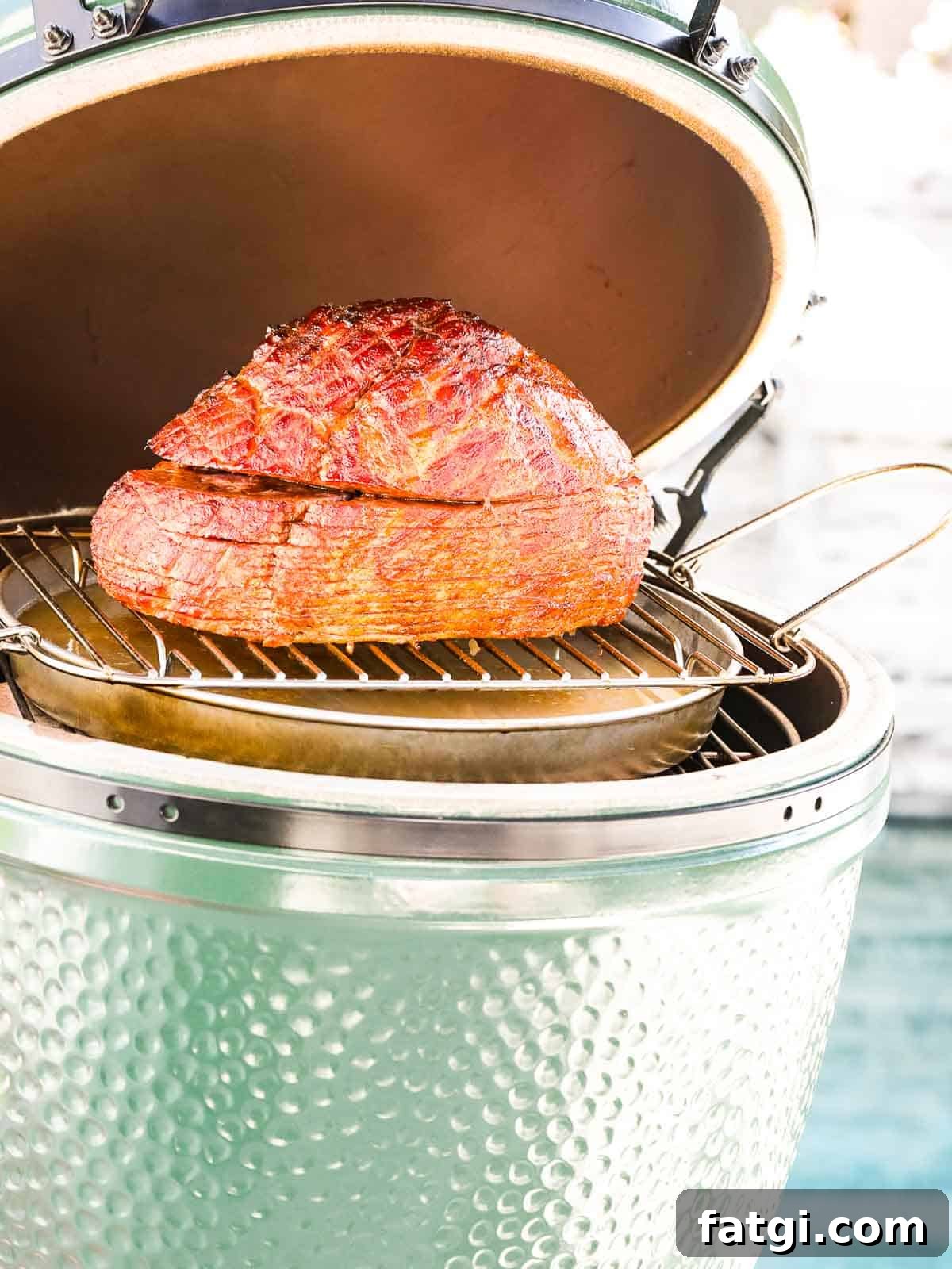 Spiral cut ham inside a smoker