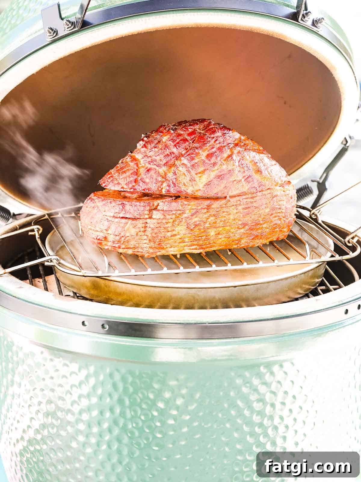 Holiday ham smoking inside a smoker