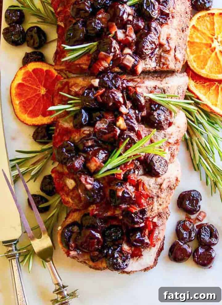 Pork loin roast topped with cherries