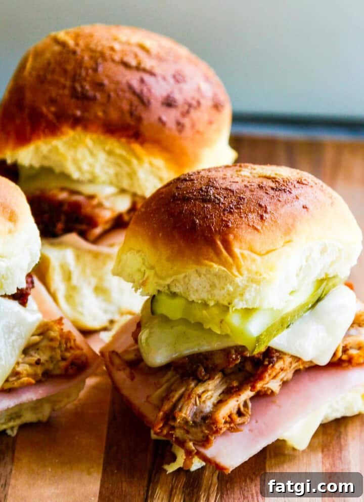 Pulled pork sliders with pickles, cheese, and ham