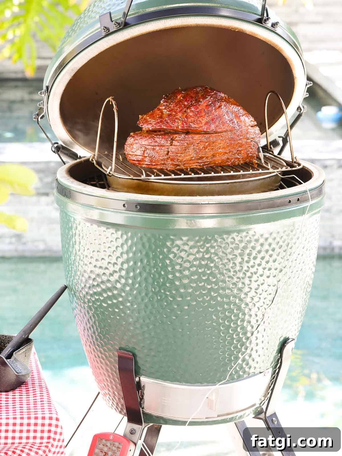 Big Green Egg smoking a glazed spiral ham