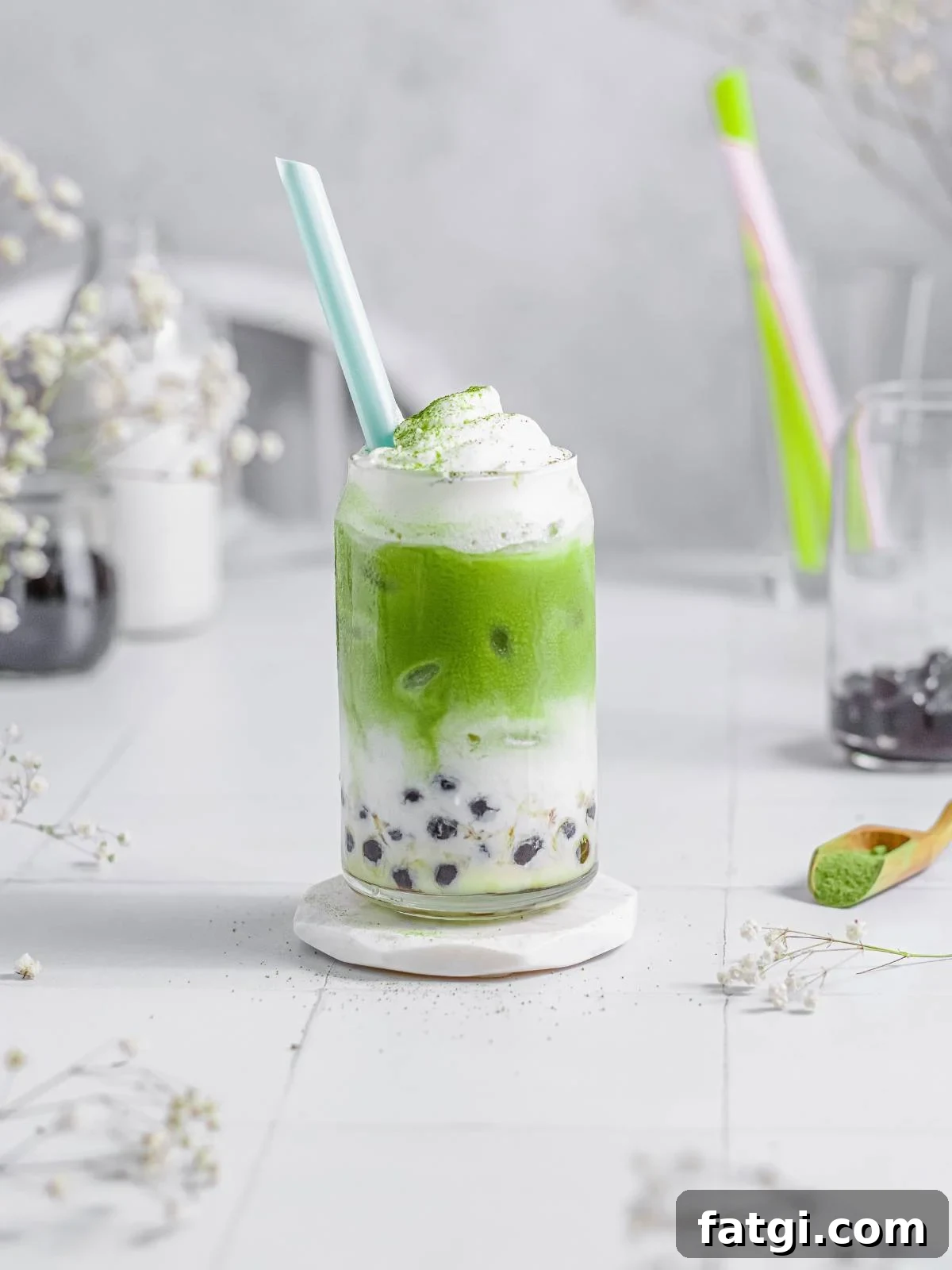 a glass of green milk tea.