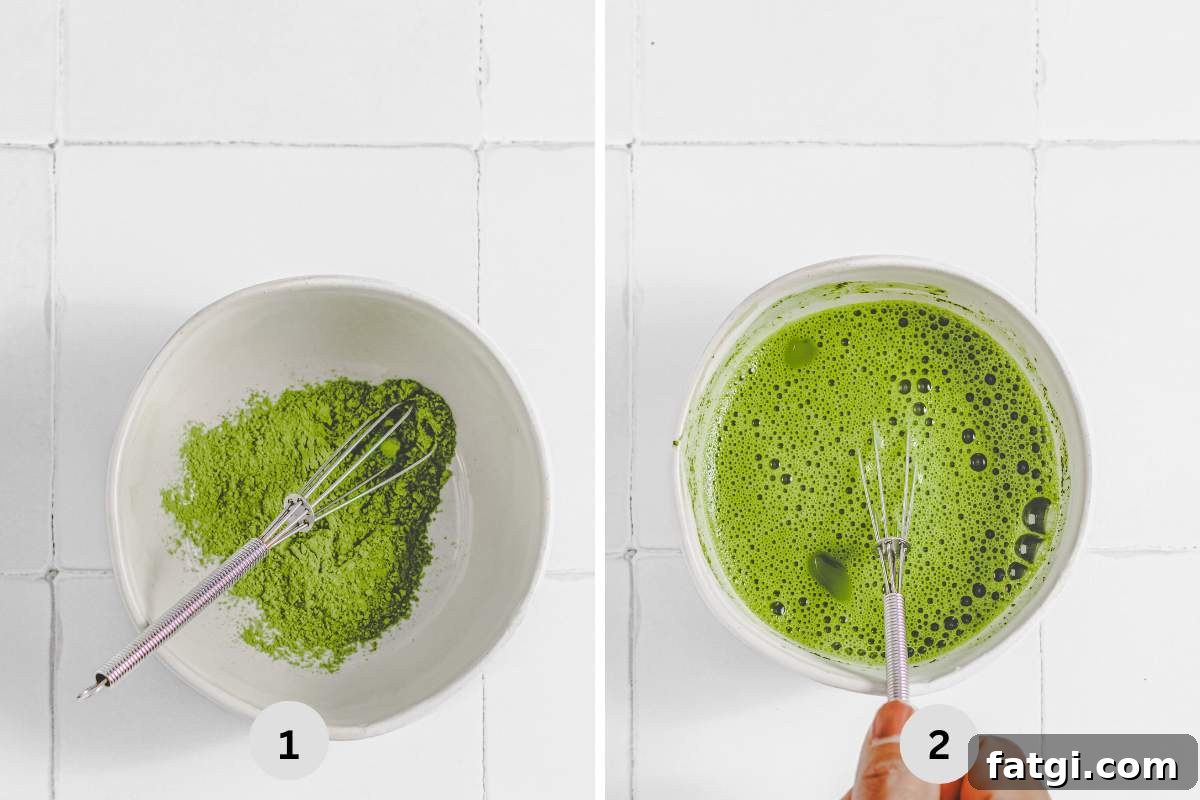 Whisking matcha powder in a zig-zag motion in a bowl.
