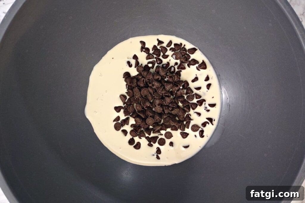 Microwave Chocolate Sauce: Homemade in Minutes 5 combine chocolate chips and evaporated milk in microwave safe bowl