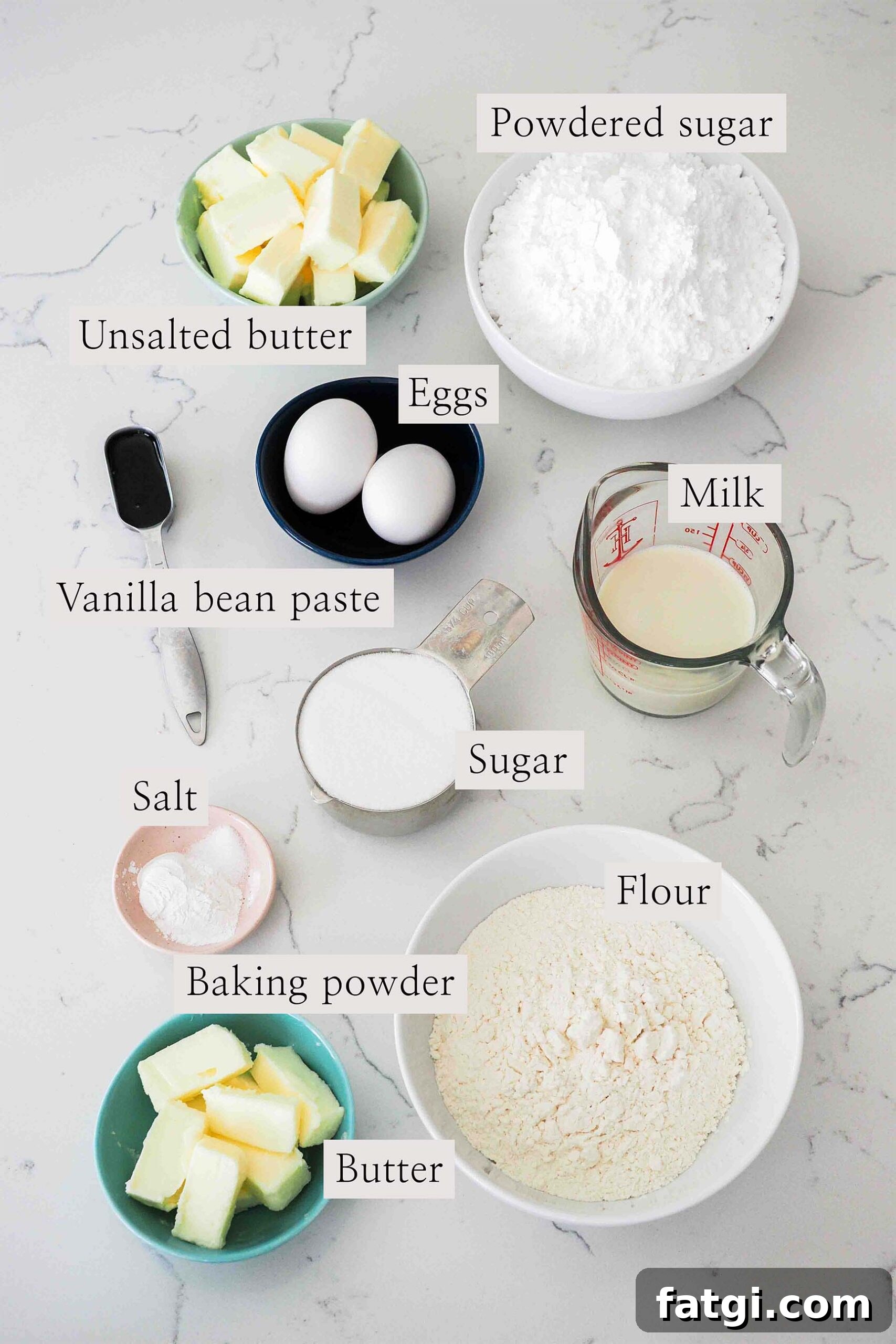 Ingredients for vanilla bean cupcakes on a counter.