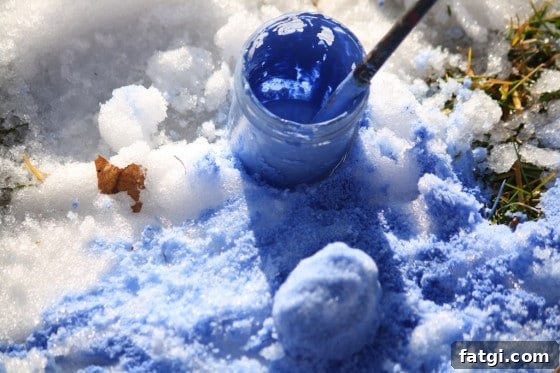 painting the snow with tempera paints