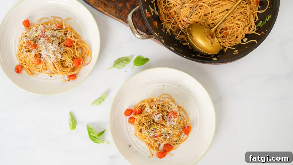 Cherry Tomato Pasta: Quick Flavorful Weeknight Dinner 4 Two plates dished up, ready to be enjoyed.