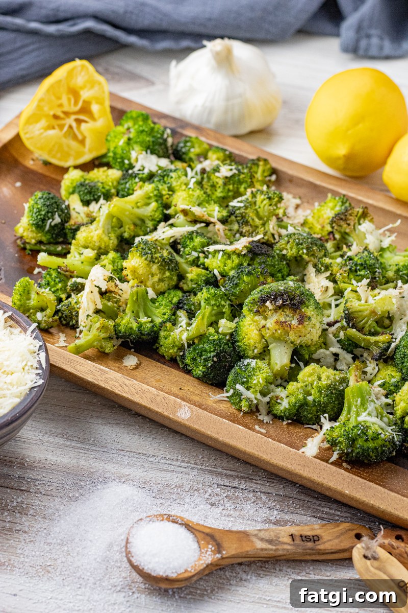 roasted broccoli on a wooden platter
