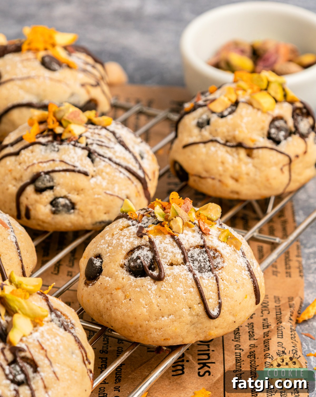 Freshly baked soft cannoli cookies on a baking sheet.