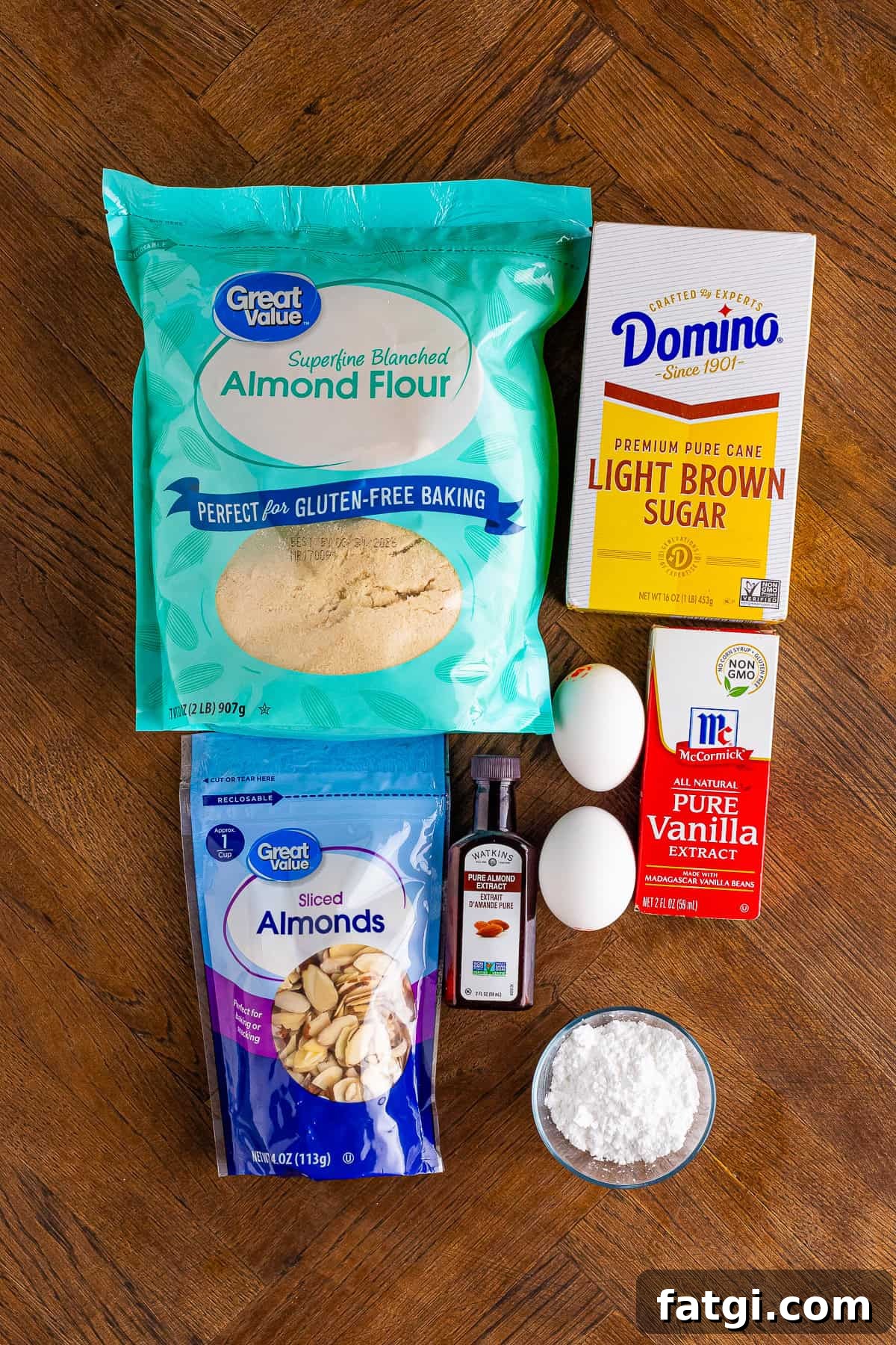 Ingredients: almond meal, brown sugar, eggs, extracts, sliced almonds, powdered sugar
