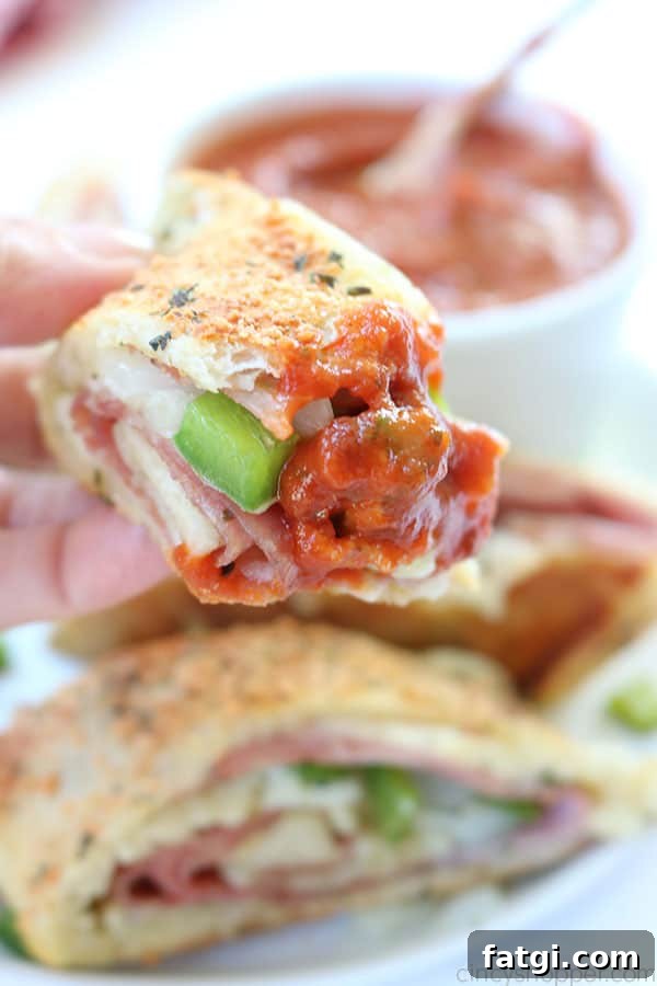 Easy Stromboli - Since we use store bought pizza dough, it comes together in no time at all. Load in your favorite toppings like ham, salami, provolone, mozzarella, peppers, onions, the combinations are endless.