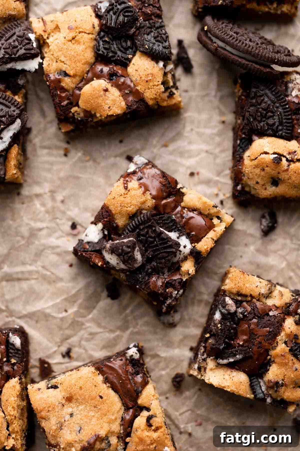 Oreo Brookies with Brownie and Cookie Layers 2 oreo brookies cut into squares and topped with oreo cookie pieces.