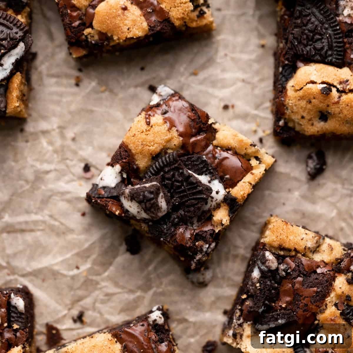 Oreo Brookies with Brownie and Cookie Layers 7 oreo brookies cut into squares and topped with oreo cookies.