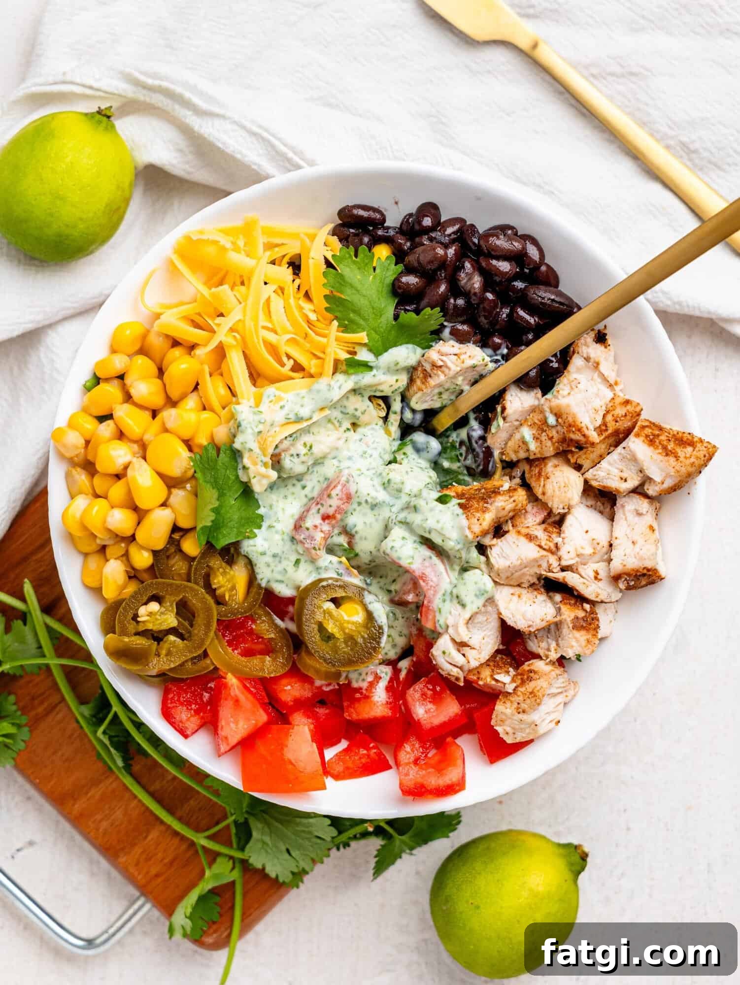 Mexican Chicken Salad ingredients in a white bowl.