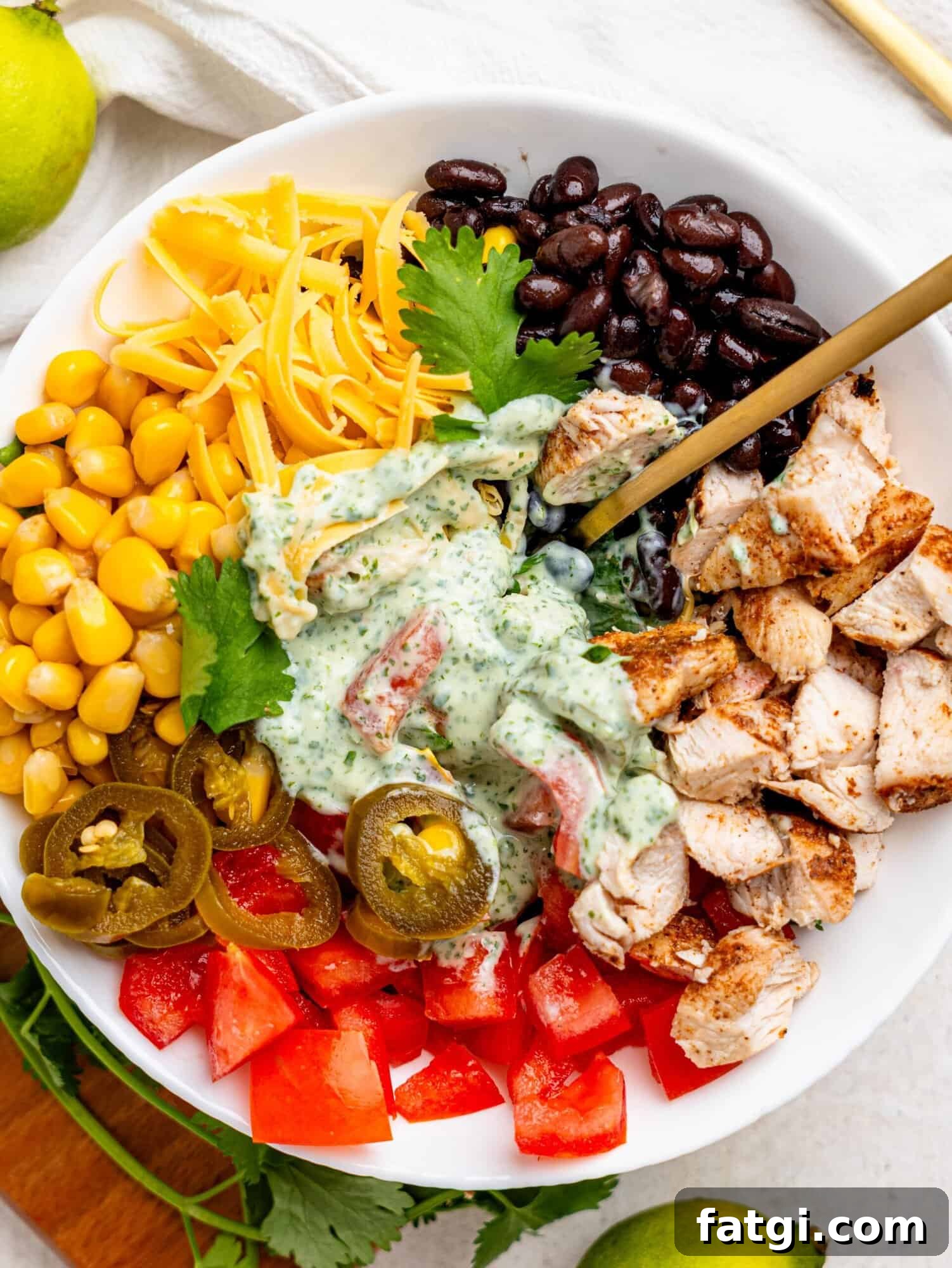 Mexican Chicken Salad ingredients in a white bowl.
