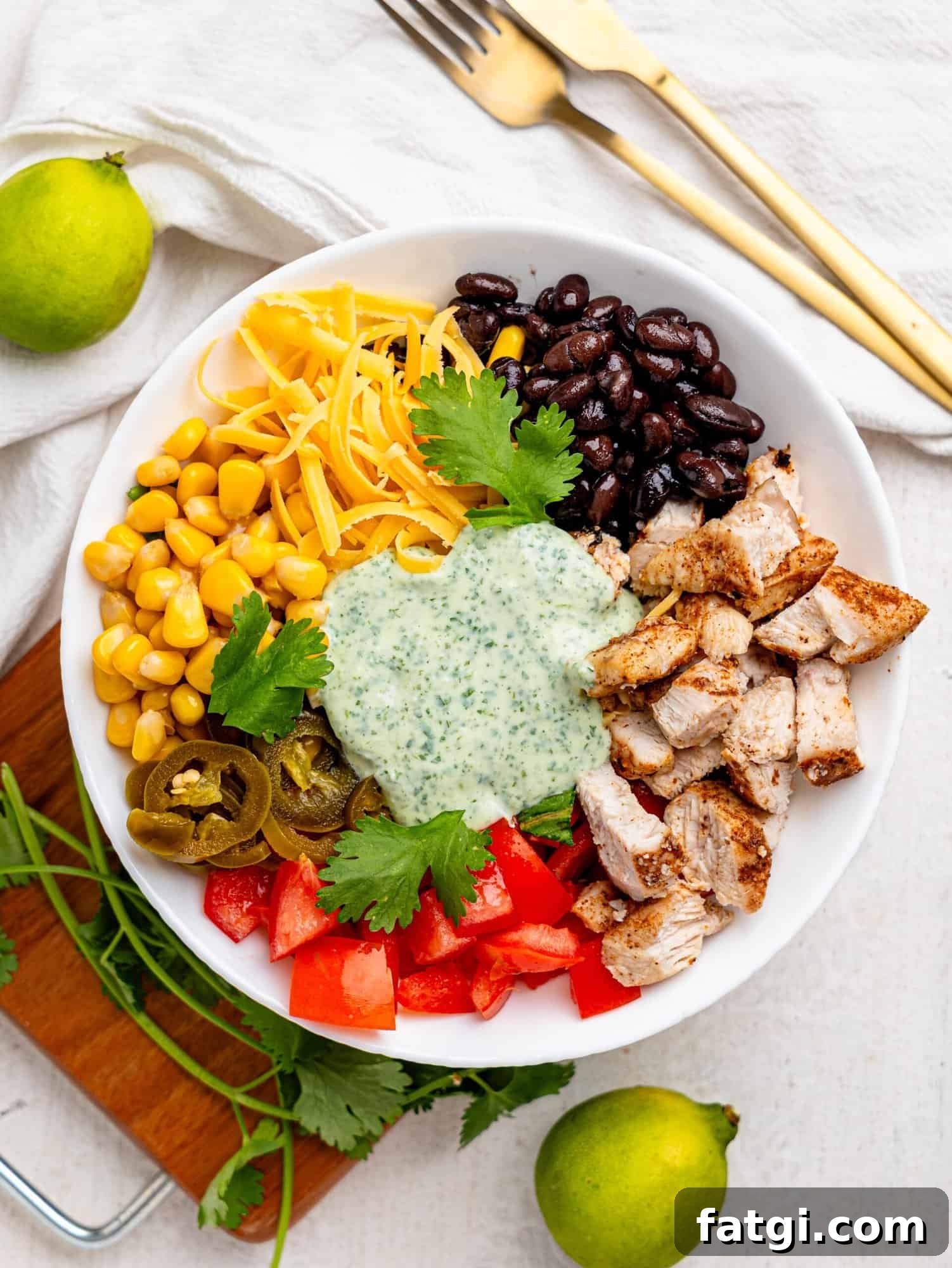 Mexican Chicken Salad ingredients in a white bowl.