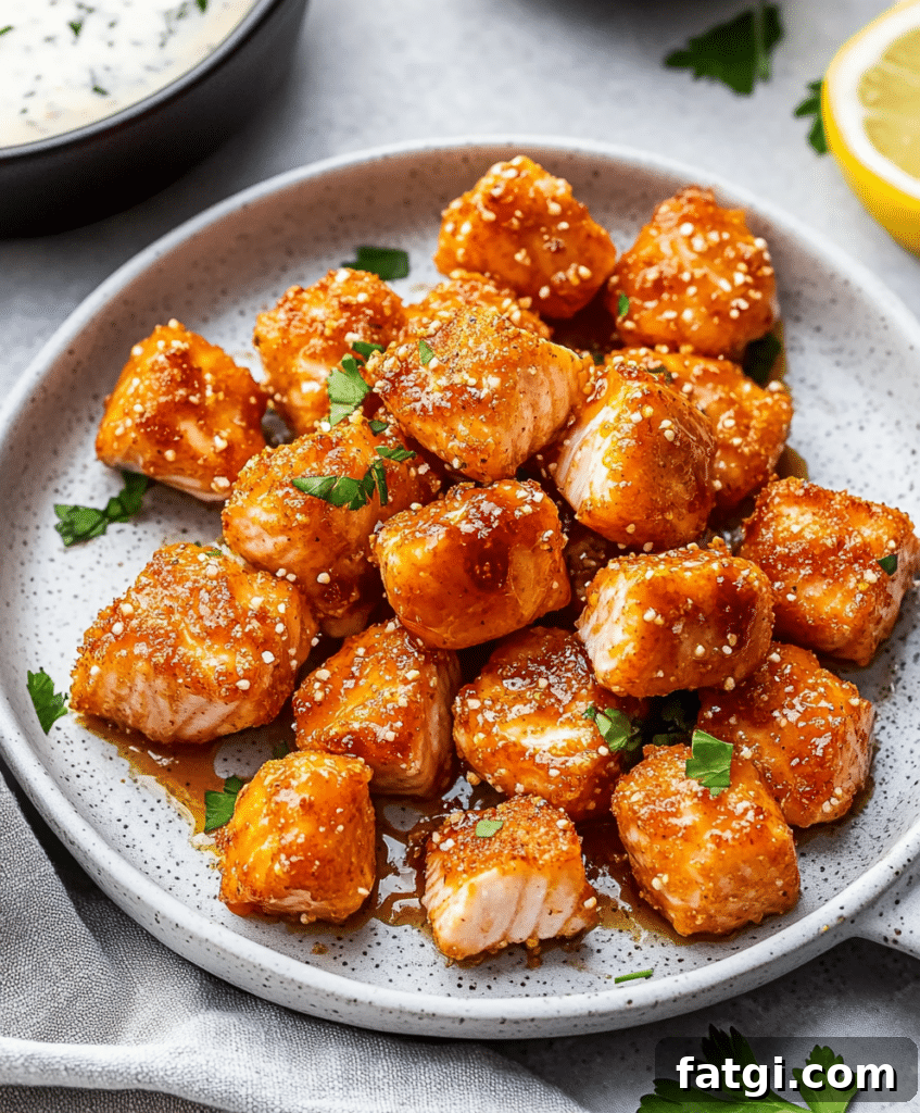 Hot Honey Air Fryer Salmon Bites Recipe 3 Ingredients for air fryer salmon bites with hot honey sauce