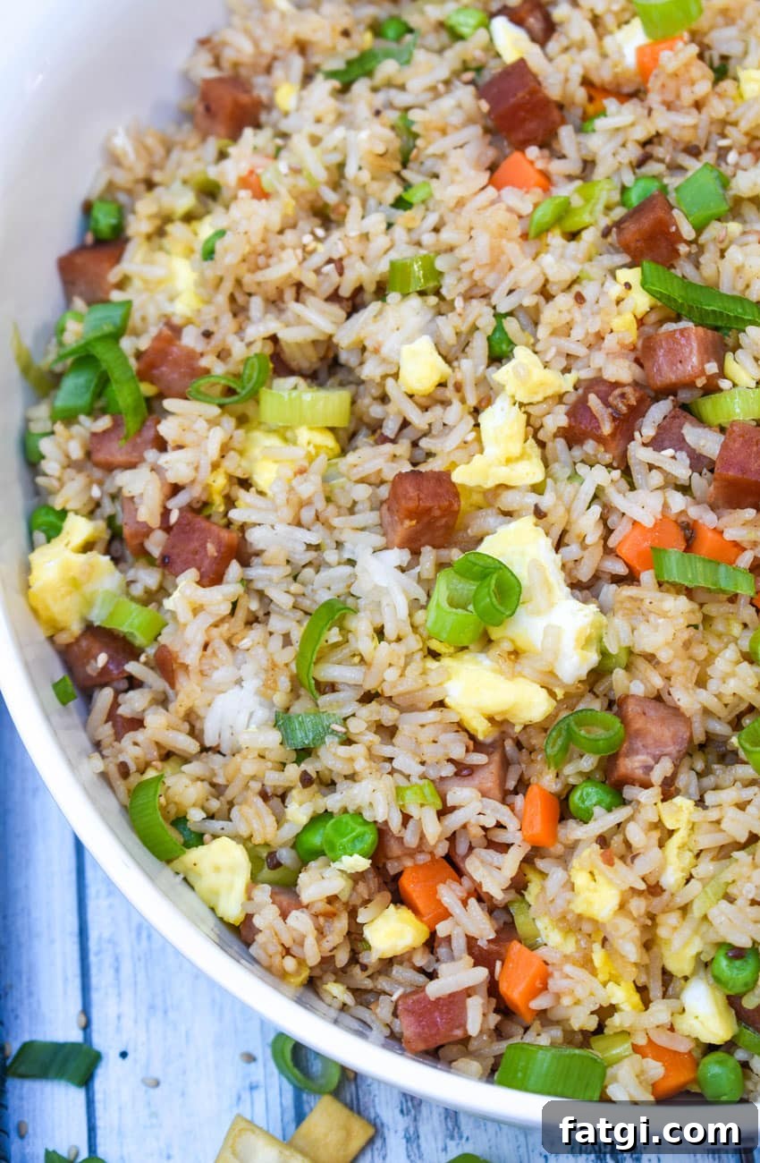 spam fried rice in a large white serving bowl