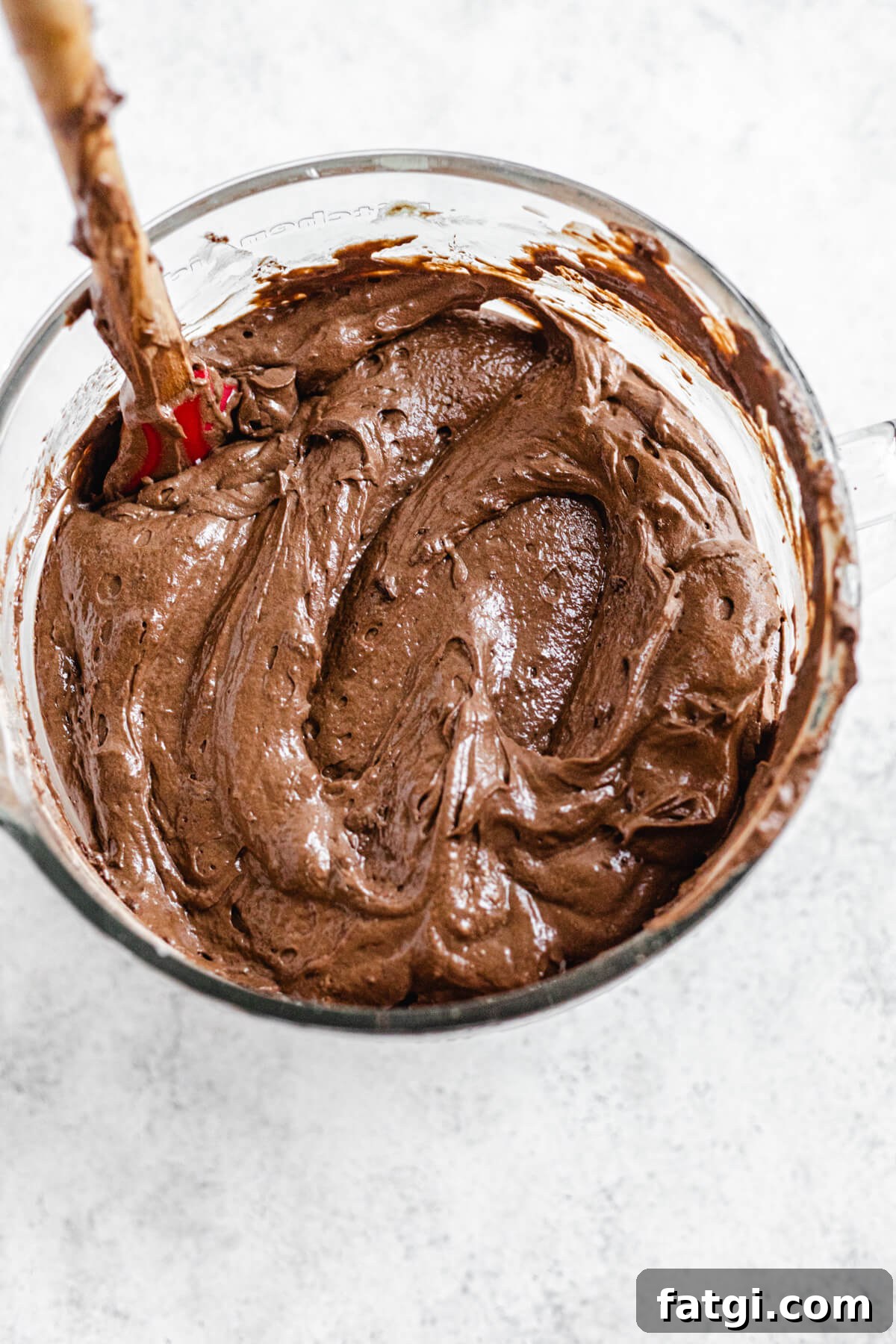 chocolate cake batter in a glass bowl