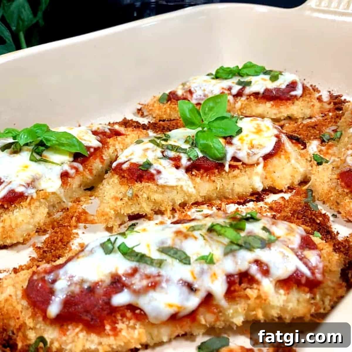 Baked Chicken Marinara Recipe 4 chicken marinara in a baking dish.