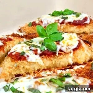 Baked Chicken Marinara Recipe 8 baked breaded chicken with marinara sauce on top.