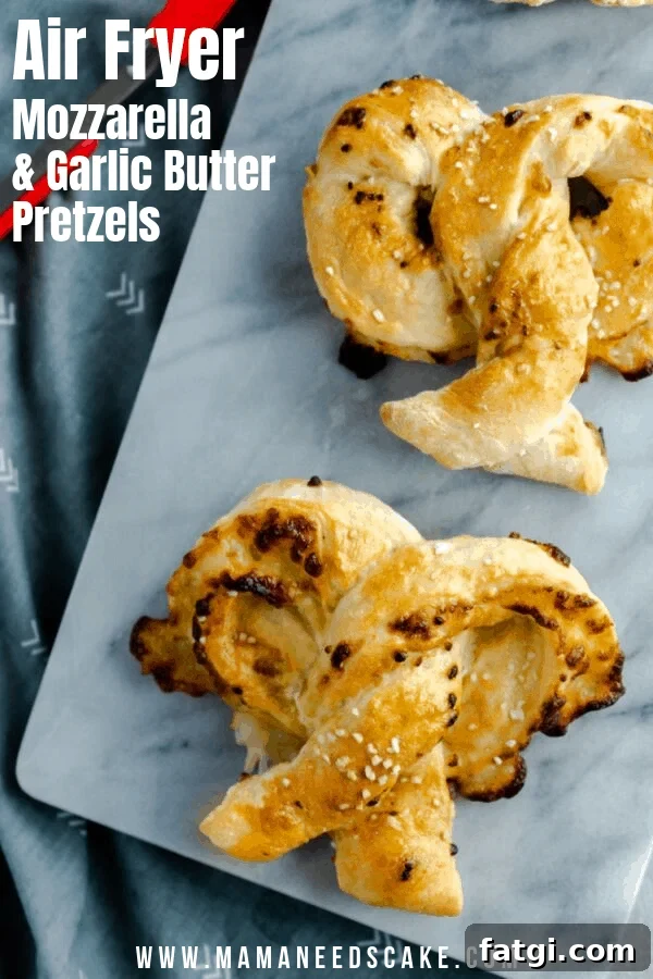 Soft and homemade pretzels rolled with mozzarella cheese and brushed with a garlic butter mixture.