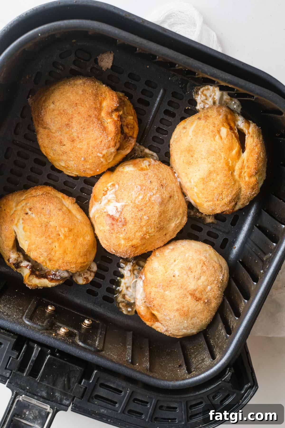 Air Fryer Peeps Crescent Rolls 7 top down view of the cooked air fryer peeps rolls inside the air fryer basket