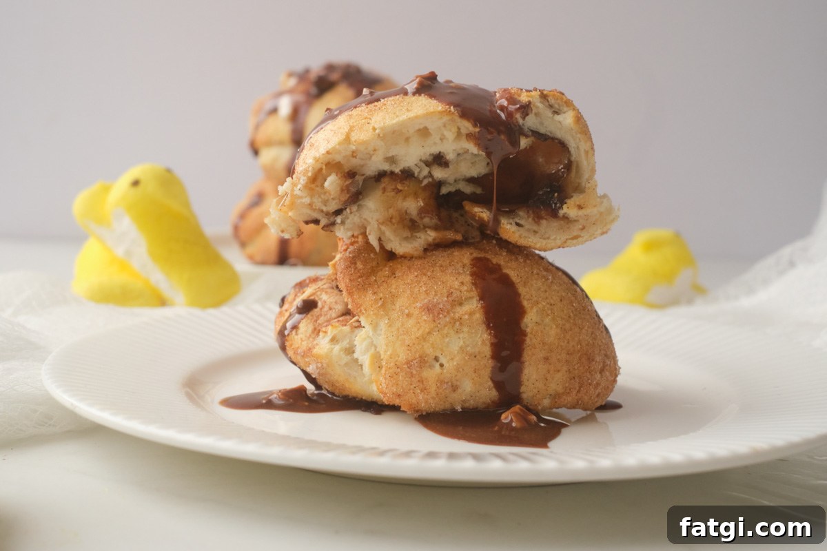 Air Fryer Peeps Crescent Rolls 10 two air fryer peeps rolls stack vertically with yellow marshmallow peeps in the background