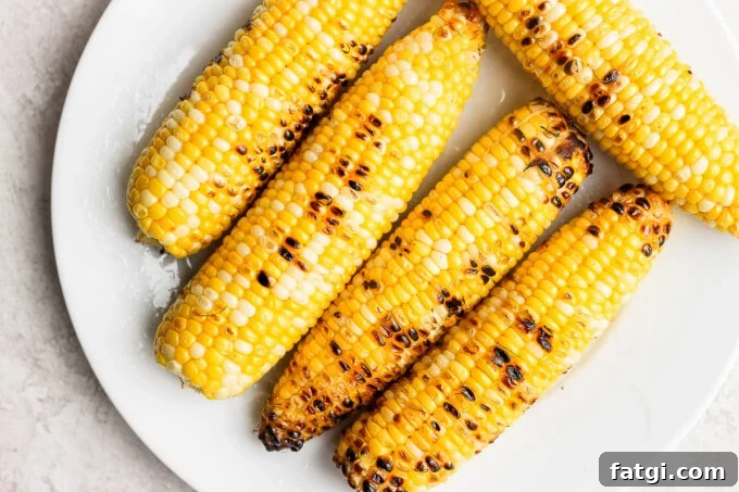 charred corn on the cobb