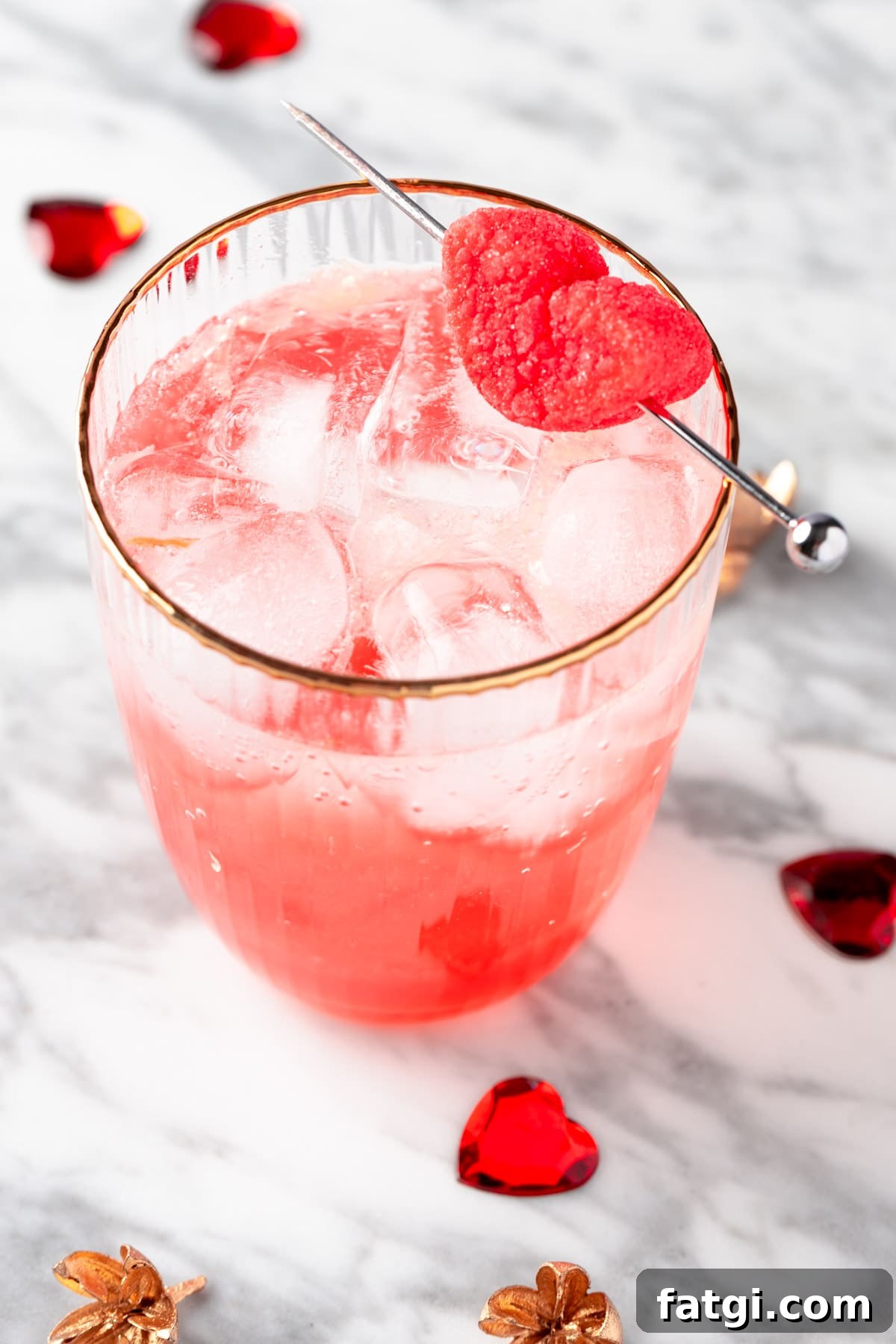 A Valentine’s Day Mocktail garnished with a heart marshmallow.