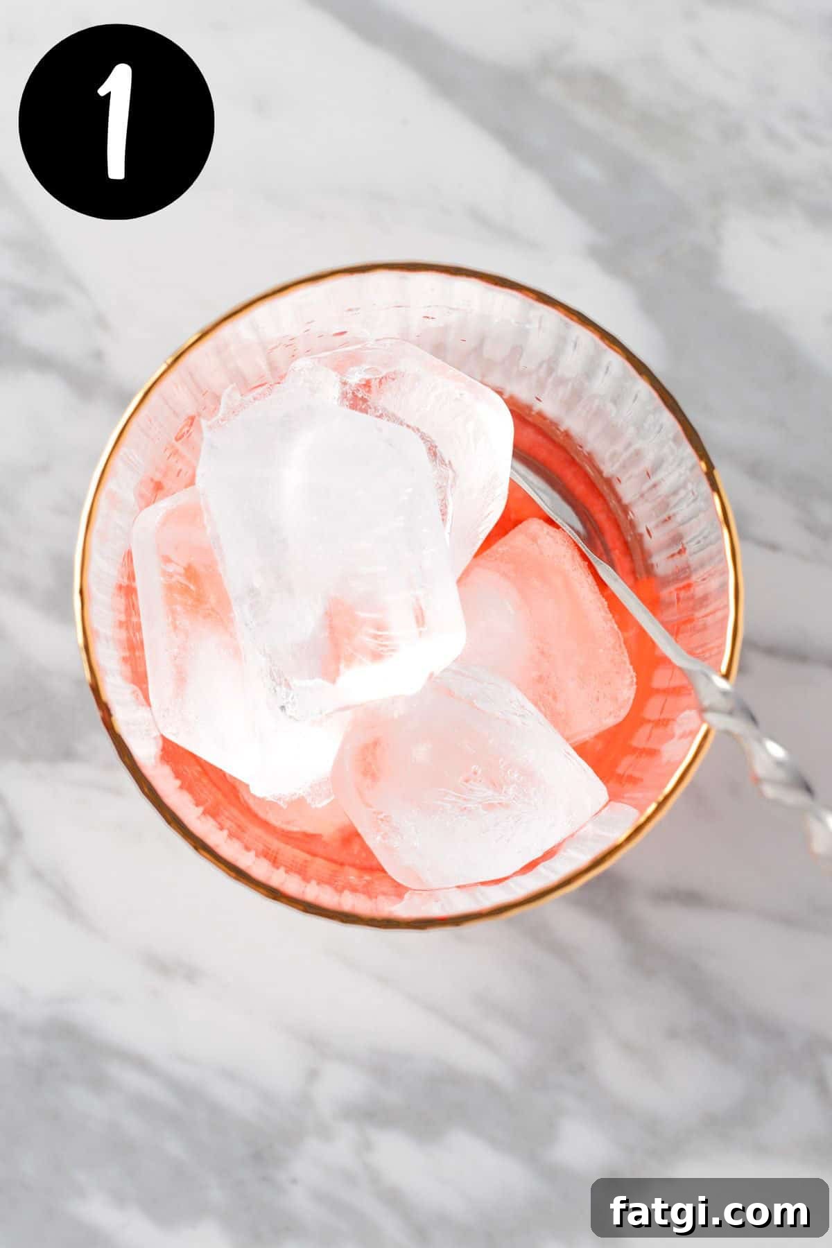 Mixing the raspberry syrup and lemon juice together.