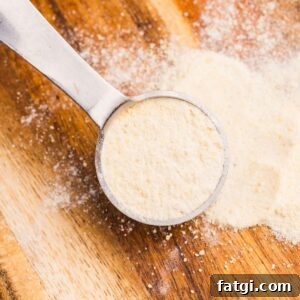 Make Garlic Powder at Home Using a Dehydrator 10 close up of measuring spoon of garlic