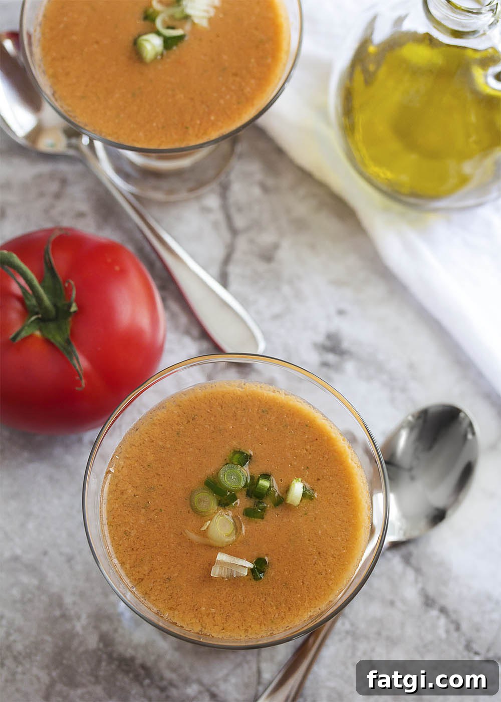 Silky Tomato and Cucumber Gazpacho Recipe 4 Smooth Tomato Gazpacho - Fresh, ripe, and juicy summer tomatoes and crisp cucumbers make a yummy gazpacho in this easy, no-cook cold soup perfect for a hot day.