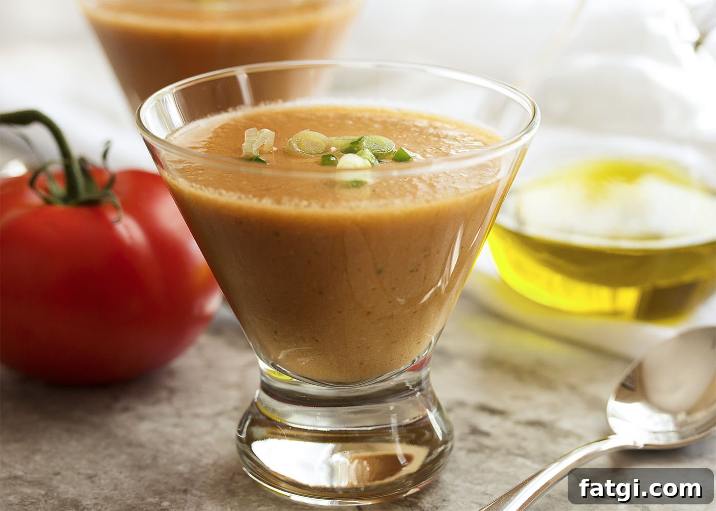 Silky Tomato and Cucumber Gazpacho Recipe 5 Smooth Tomato Gazpacho - Fresh, ripe, and juicy summer tomatoes and crisp cucumbers make a yummy gazpacho in this easy, no-cook cold soup perfect for a hot day.